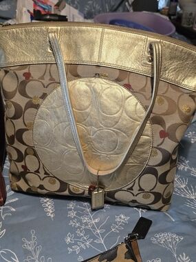 Coach Signature Canvas Tote with Metallic Gold Accents and Heart Detail